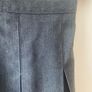 Dunnes grey skirt (as new) age 7 Image 2