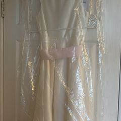 Marks and Spencer ivory dress with pink bow