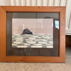 Vintage Watercolour Painting of a Lighthouse on a Rock Formation