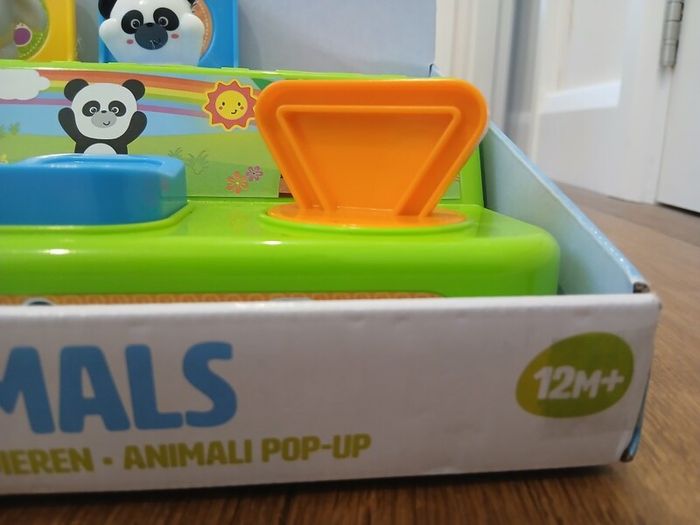 Fisher Price Doll House and pop up toy