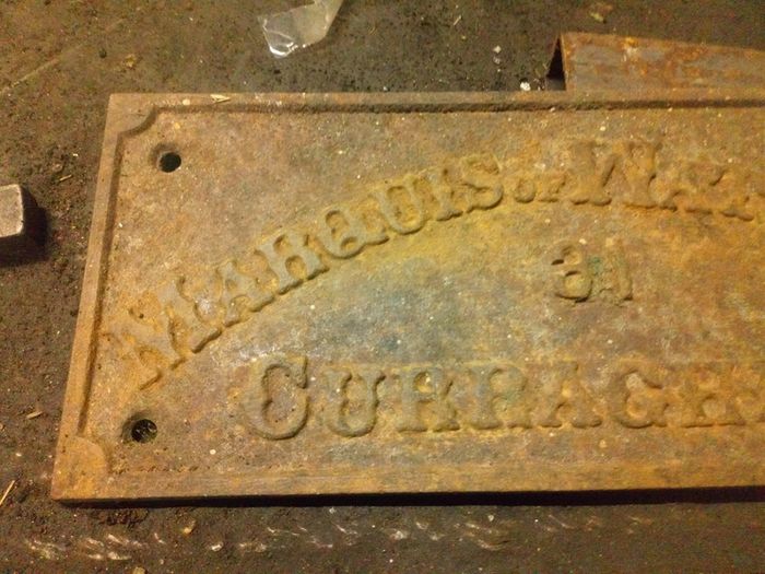 cast iron sign