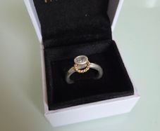 Pandora 14k Gold & Silver halo ring clear CZ  Size 56. Some sign of wear at the back but otherwise nothing wrong