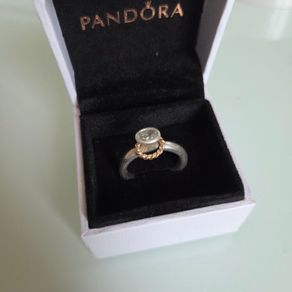 Pandora 14k Gold & Silver halo ring clear CZ  Size 56. Some sign of wear at the back but otherwise nothing wrong