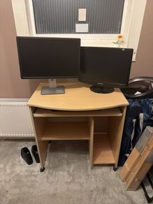 desk, monitors and keyboard