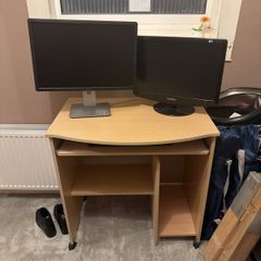 desk, monitors and keyboard