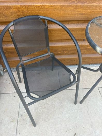 Small glass top garden table and x2 metal frame chairs