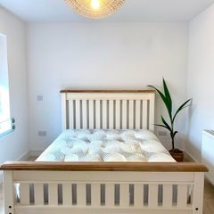 Excellent condition solid oak king size bed frame and mattress