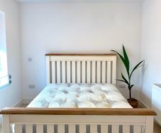 Excellent condition solid oak king size bed frame and mattress