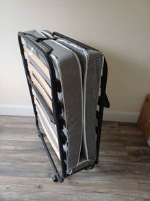 Single Bed - folding and portable bed with mattress. Harvey Norman , only used 4/5 times.