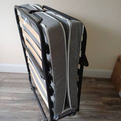 Single Bed - folding and portable bed with mattress. Harvey Norman , only used 4/5 times.
