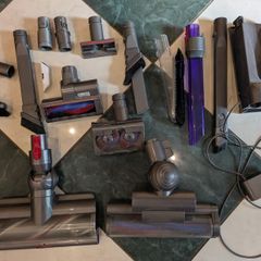 Two Dyson Vacuum Cleaners and accessories