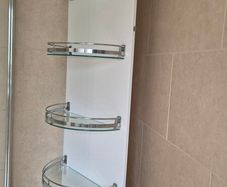 Rotating Bathroom Mirror with Glass Storage Shelves