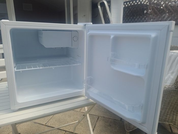 small fridge . with ice box
