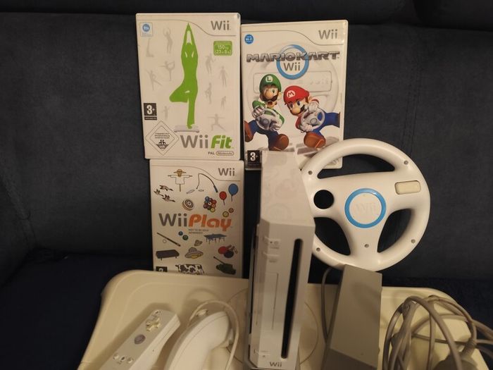 Wii + balance board, Mario kart, steering wheel, dance games
