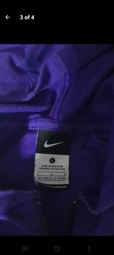 girls purple and pink Nike hoody
