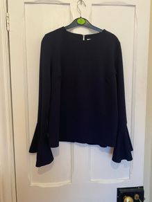 Warehouse long peplum sleeve top