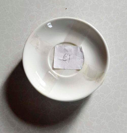 Milk Jug & 4 Saucers (used).