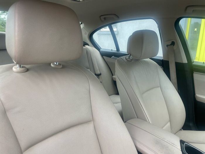 BMW 5 series, black with cream leather interior