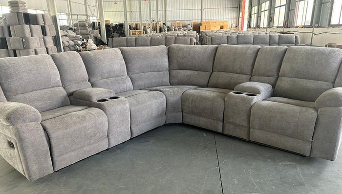 Corner sofa recliner in fabric