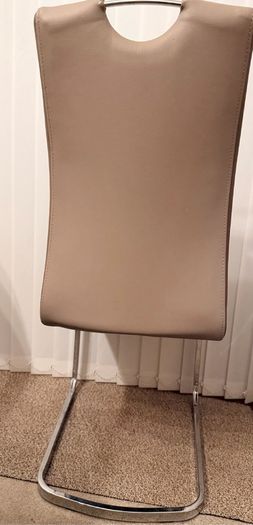 A set of 6 Dining room leather chairs with chrome frames