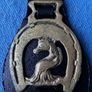 Vintage horse brasses on leather strap Image 4