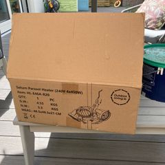 Parasol heater from OutdoorLiving -Box opened as shown but item never removed