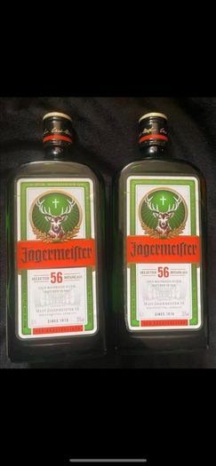 Jagermeister telling whiskey gin empty bottles