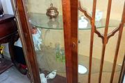 Antique cabinet with wavy shelves