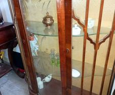 Antique cabinet with wavy shelves