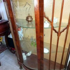 Antique cabinet with wavy shelves