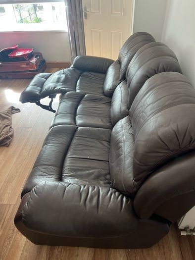 Brown leather recliner sofa