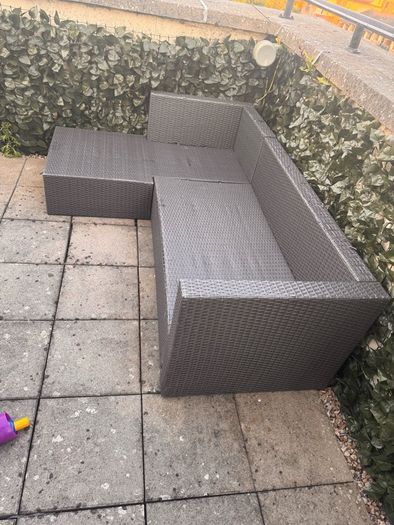 Garden sofa with cushions