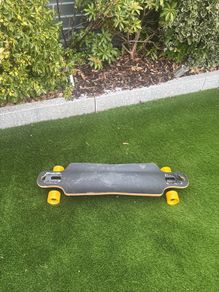 Skateboard with colourful back design