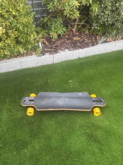 Skateboard with colourful back design