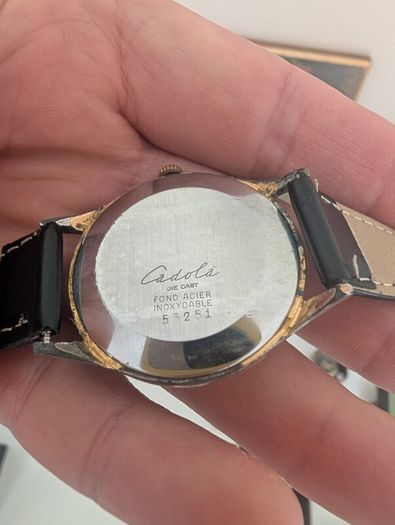 This is a vintage Cadola manual-wind mechanical wristwatch dating from approximately the 1950s to the 1960s.