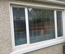 Large double glazed window including blinds