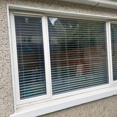 Large double glazed window including blinds