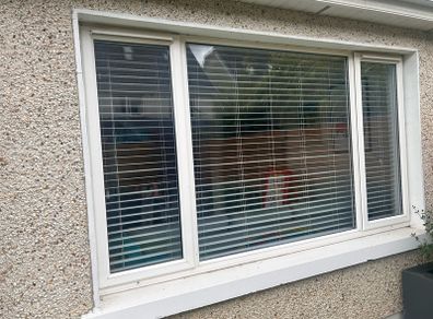 Large double glazed window including blinds
