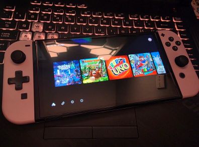 Nintendo Switch OLED (Cheery Blossoms Pink Shell)