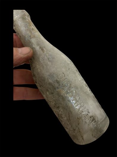 old glass mineral bottle