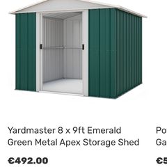 Green metal garden shed