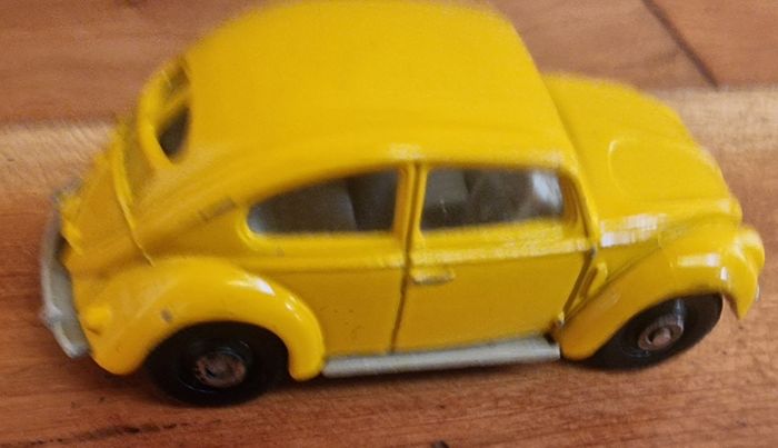 4 vintage toy cars -