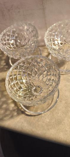 Vintage cut glass or crystal  set of 3 dessert dishes or bowls featuring a diamond or criss-cross pattern.