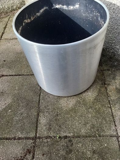 Brushed aluminium plant pot