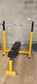 Adjustable bench and squat rack with weights