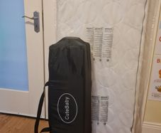 Full size Travel cot with mattress and bedding