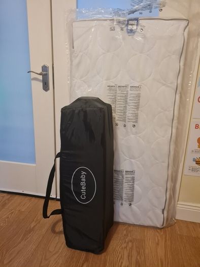 Full size Travel cot with mattress and bedding