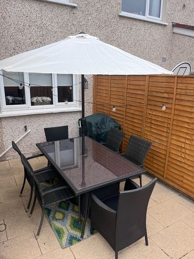 garden furniture table and chairs, parasol and parasol weight