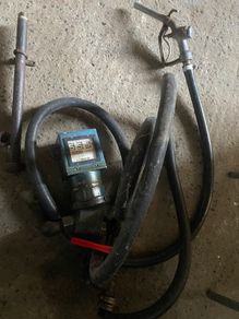 Oil tank fuel dispenser clock