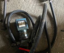 Oil tank fuel dispenser clock